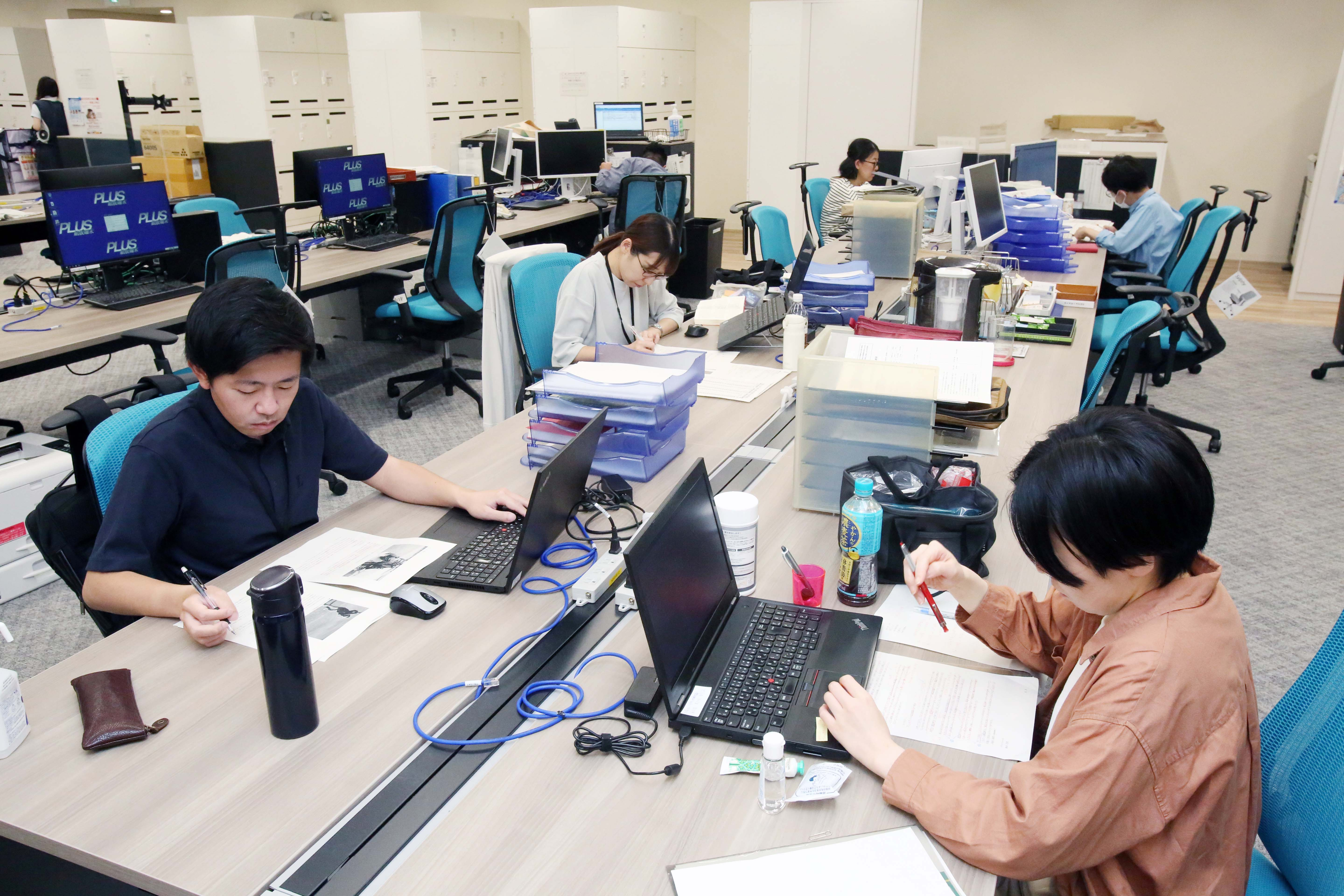 校閲事業部
